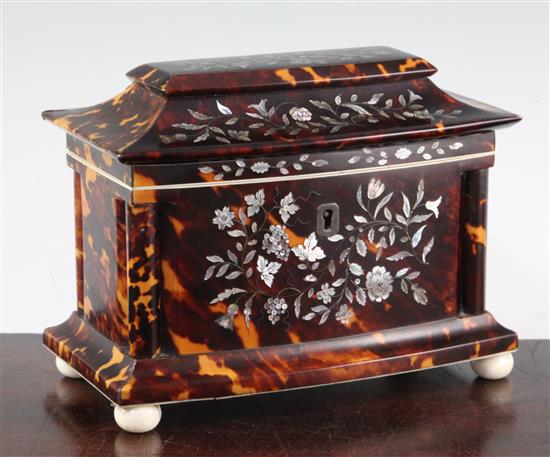 An early Victorian mother of pearl inlaid tortoiseshell tea caddy, 7in.
